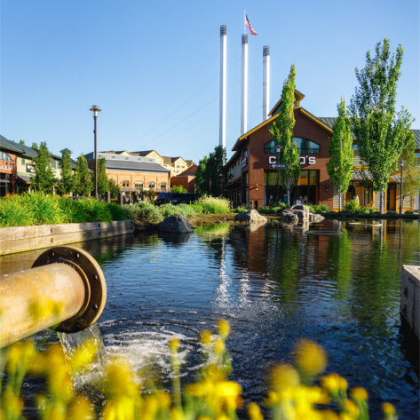 View of the river and the Old Mill Shopping District in Bend, Oregon.
