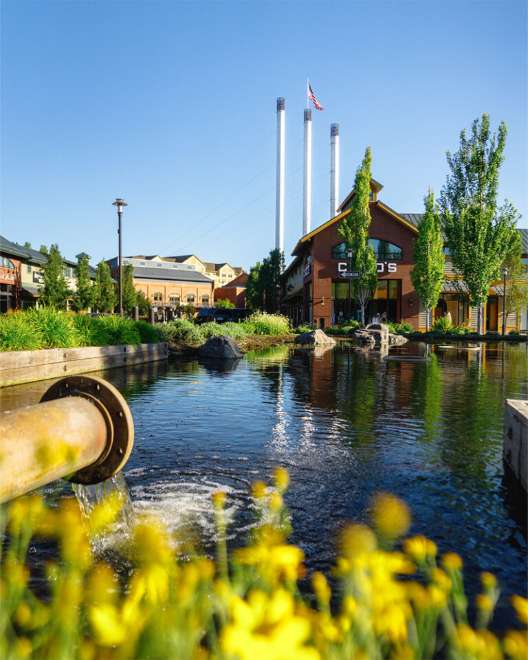 View of the river and the Old Mill Shopping District in Bend, Oregon.