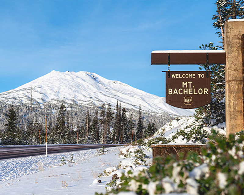 The sign welcoming you to Mt. Bachelor along the Cascade Lakes Scenic Byway. 