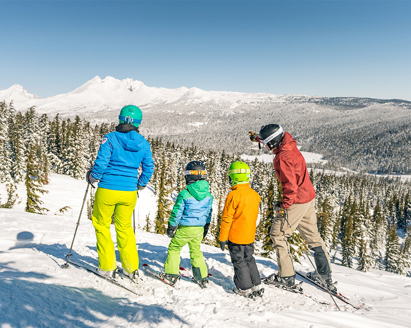 Family skiing at Mt. Bachelor Ski area in Bend, Oregon.