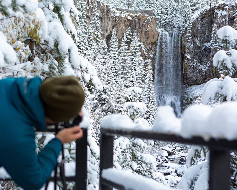 Taking a photo of Tumalo Falls in the winter, near Bend, OR