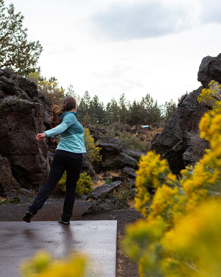 Valarie Doss playing disc golf in Bend, OR