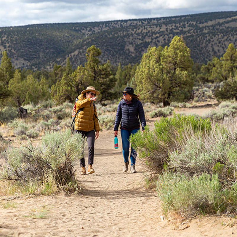 Two women walk in the Oregon Badlands Wilderness
