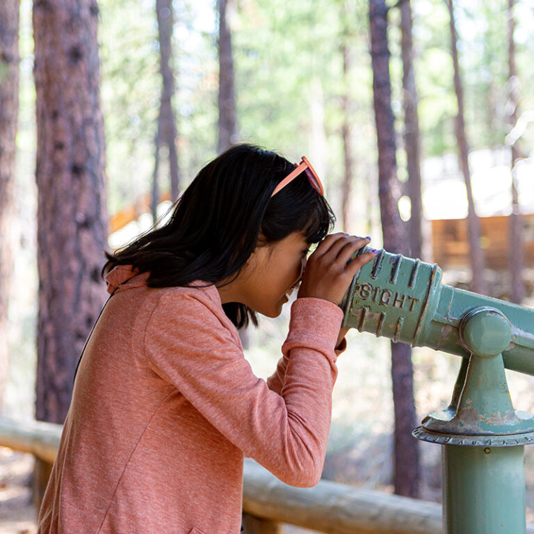 Looking through a scope at the High Desert Museum in Bend, OR