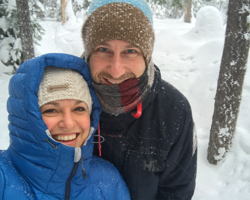 Blogger Tawna and her husband seek shelter from the wind in the pine forest around Meissner Sno-Park.