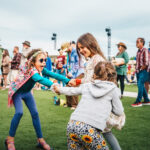 Little girls dancing at a concert in Bend, OR