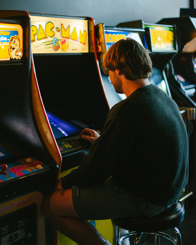 Playing classic video games at Vector Volcano in downtown Bend, Oregon. 