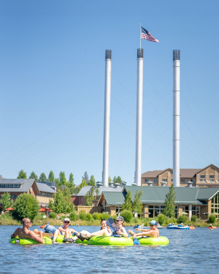 A group floats along the Deschutes River in Bend, Oregon.