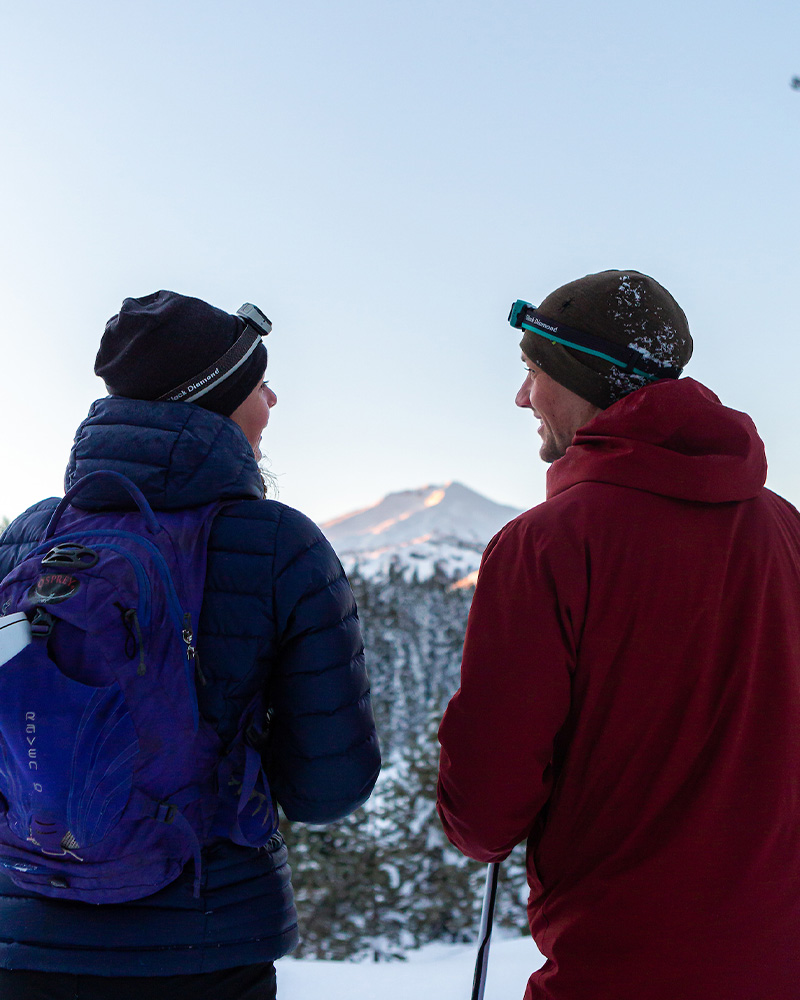A couple goes cross country skiing around Todd Lake near Bend, Oregon.